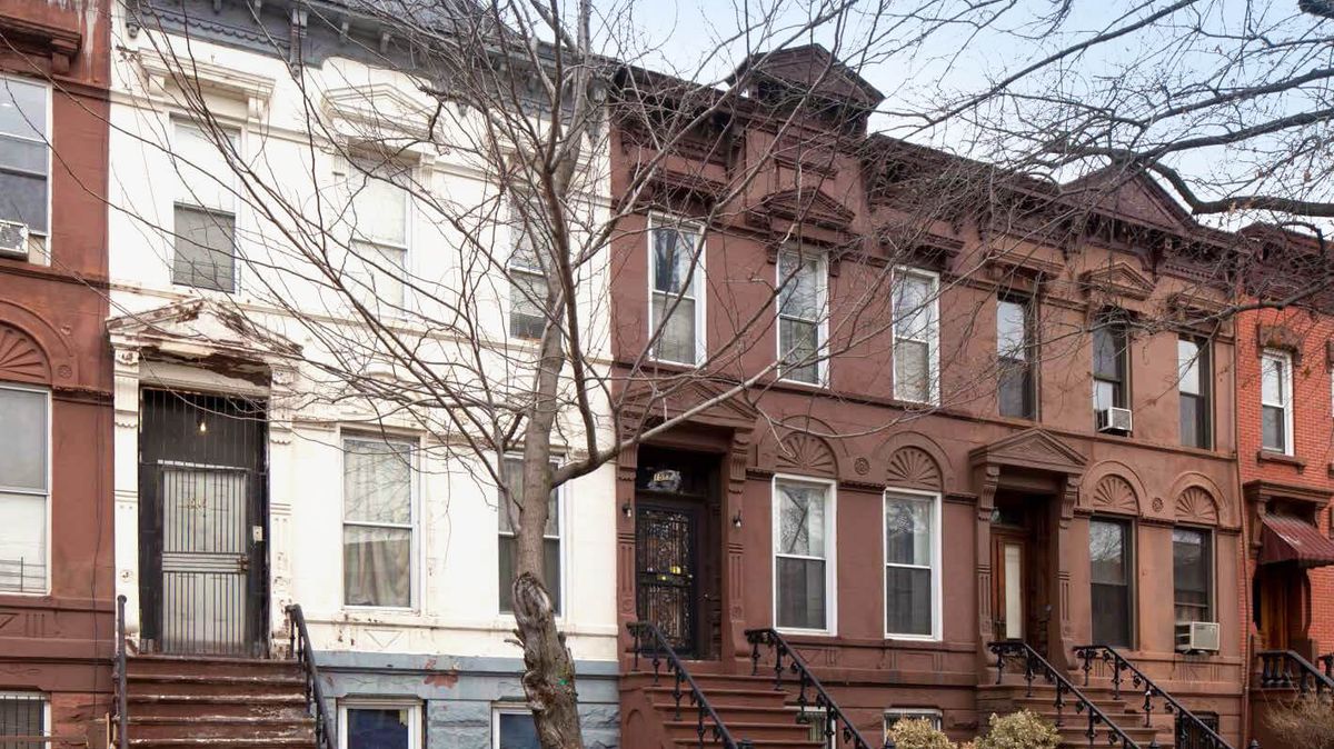 Row of Brooklyn brownstone homes on a residential street
