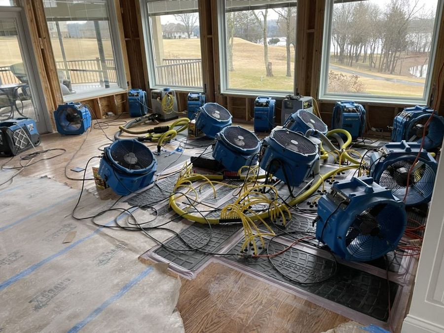 Air movers and dehumidification equipment set up for structural drying